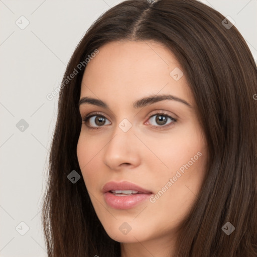 Neutral white young-adult female with long  brown hair and brown eyes