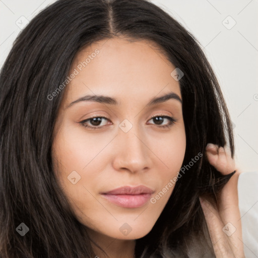 Neutral white young-adult female with long  brown hair and brown eyes