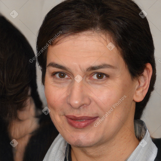 Joyful white adult female with medium  brown hair and brown eyes