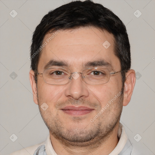 Joyful white adult male with short  black hair and brown eyes