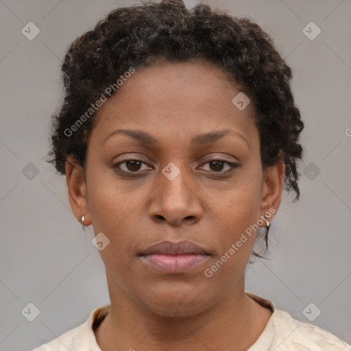 Neutral black young-adult female with short  brown hair and brown eyes