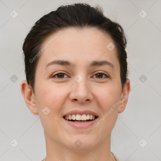 Joyful white young-adult female with short  brown hair and brown eyes