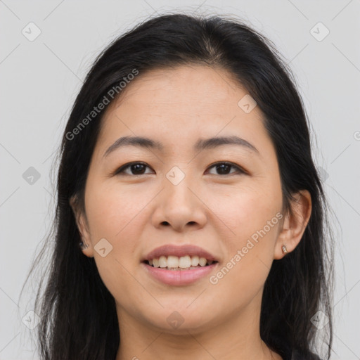 Joyful asian young-adult female with long  brown hair and brown eyes