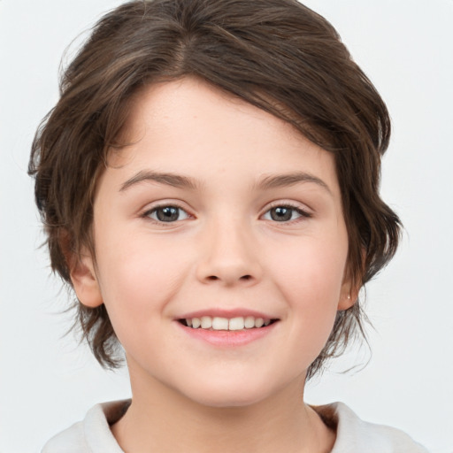 Joyful white child female with medium  brown hair and brown eyes