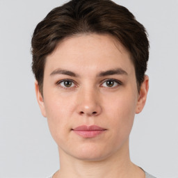 Neutral white young-adult female with short  brown hair and brown eyes