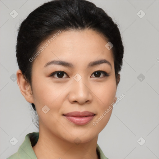 Joyful asian young-adult female with short  brown hair and brown eyes