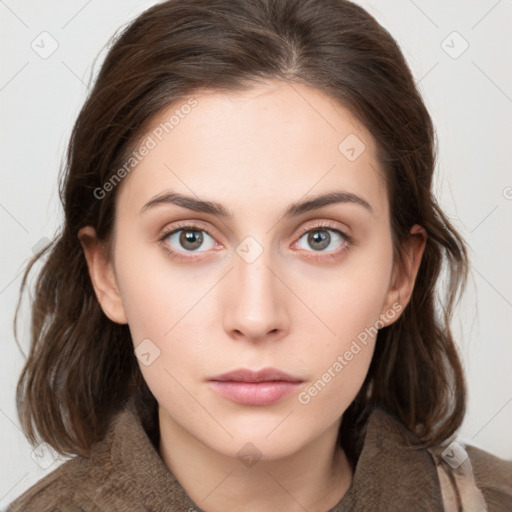 Neutral white young-adult female with medium  brown hair and brown eyes