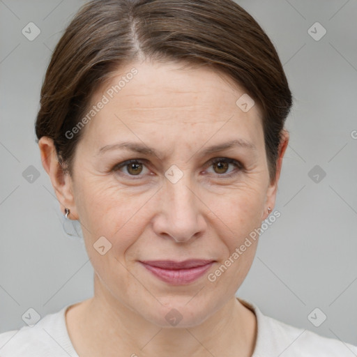 Joyful white adult female with short  brown hair and brown eyes