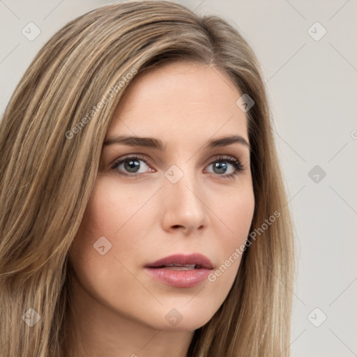 Neutral white young-adult female with long  brown hair and brown eyes