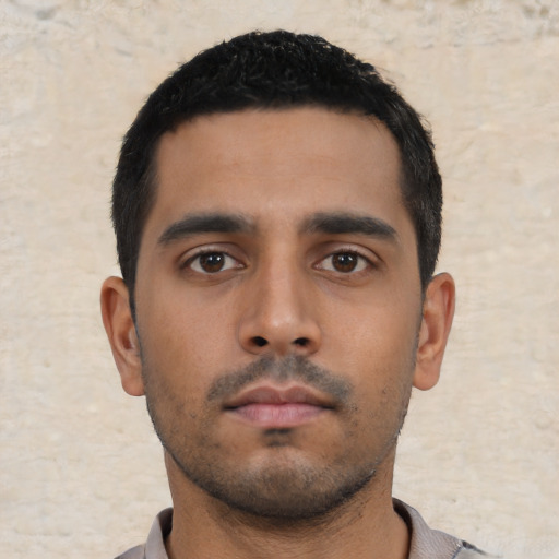 Neutral asian young-adult male with short  black hair and brown eyes