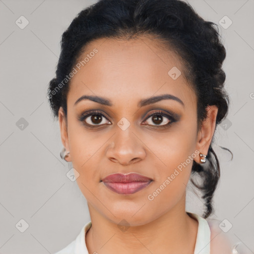 Joyful black young-adult female with medium  black hair and brown eyes