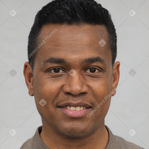 Joyful black young-adult male with short  black hair and brown eyes