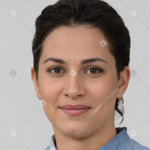 Joyful white adult female with short  brown hair and brown eyes