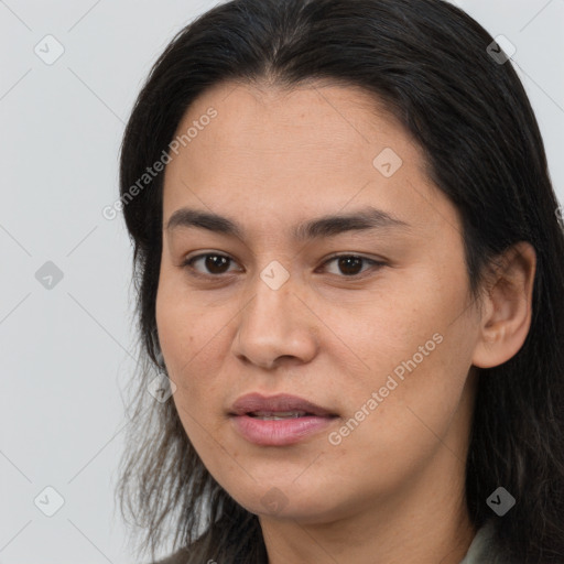 Joyful white young-adult female with long  brown hair and brown eyes