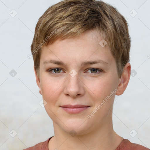 Joyful white young-adult female with short  brown hair and grey eyes