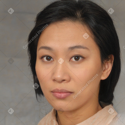 Neutral asian young-adult female with medium  brown hair and brown eyes