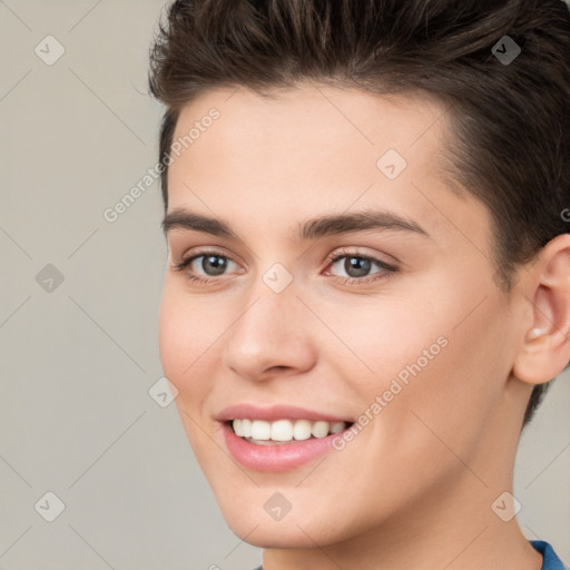 Joyful white young-adult female with short  brown hair and brown eyes