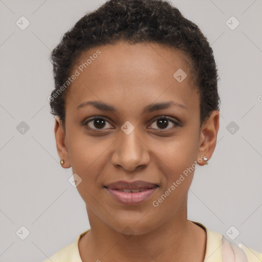 Joyful black young-adult female with short  brown hair and brown eyes