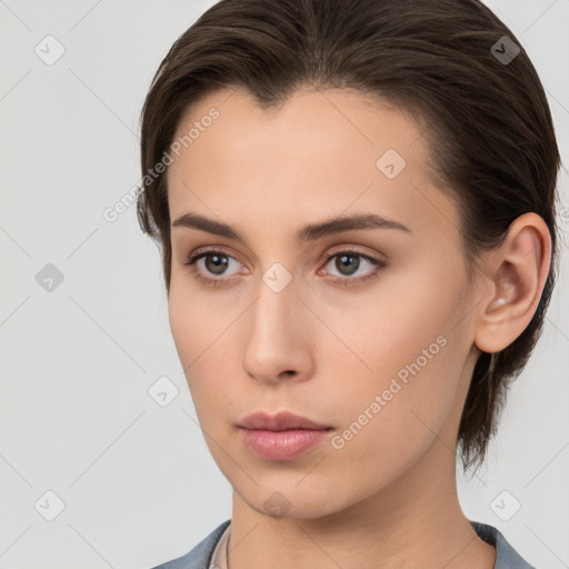 Neutral white young-adult female with medium  brown hair and brown eyes