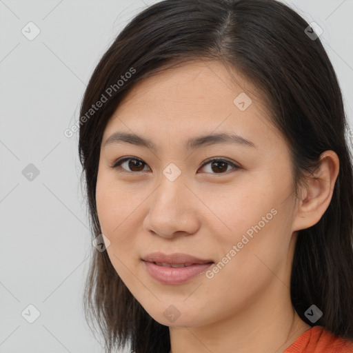 Joyful white young-adult female with long  brown hair and brown eyes