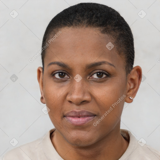 Joyful black young-adult female with short  brown hair and brown eyes