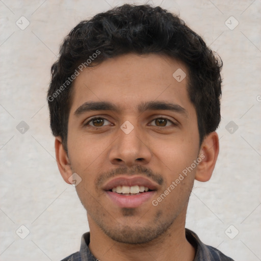 Joyful latino young-adult male with short  black hair and brown eyes