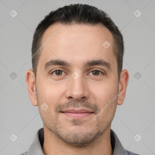 Joyful white young-adult male with short  brown hair and brown eyes