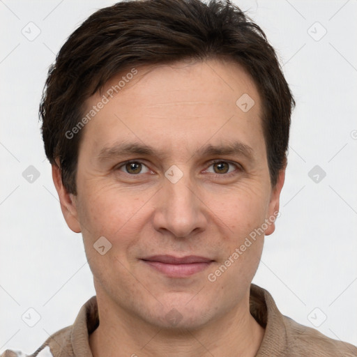 Joyful white adult male with short  brown hair and grey eyes