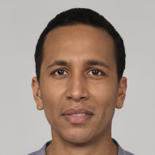 Neutral black young-adult male with short  black hair and brown eyes