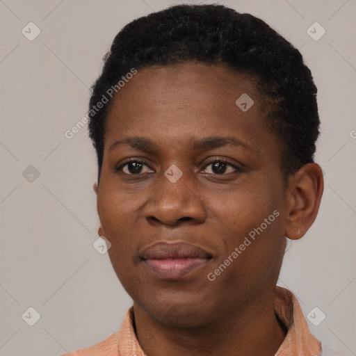 Joyful black young-adult female with short  black hair and brown eyes