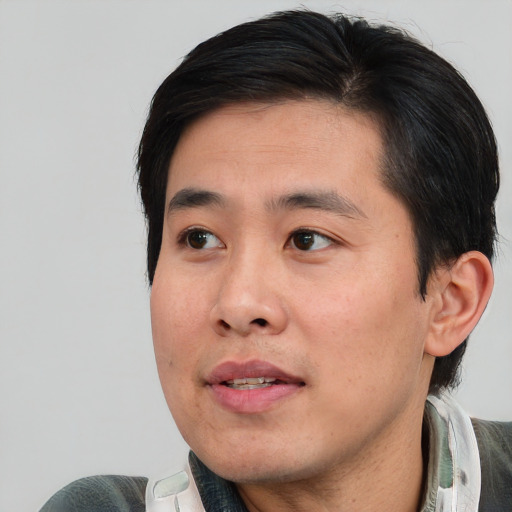 Neutral asian young-adult male with short  black hair and brown eyes