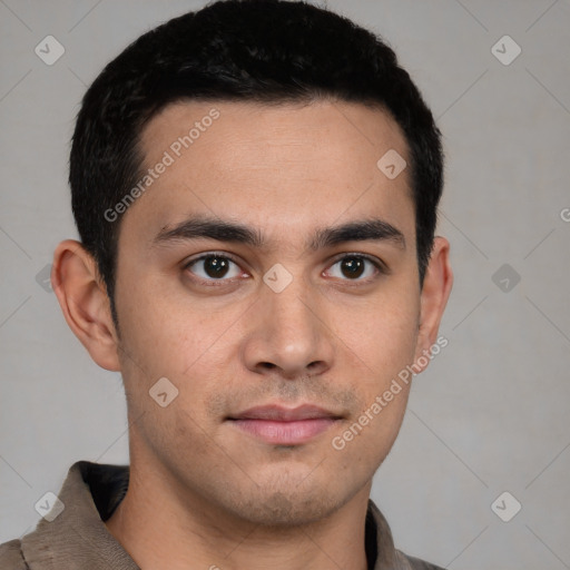 Joyful latino young-adult male with short  black hair and brown eyes