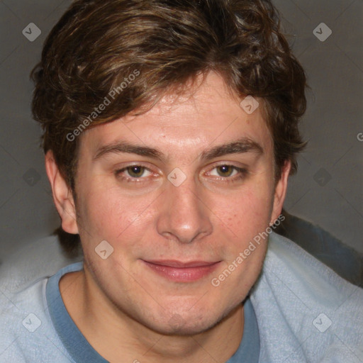 Joyful white young-adult male with short  brown hair and blue eyes