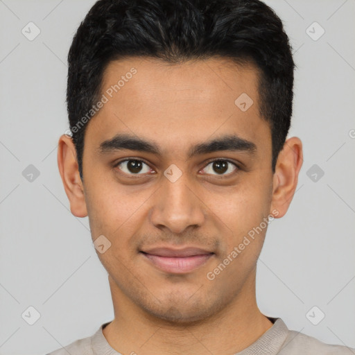 Joyful latino young-adult male with short  black hair and brown eyes