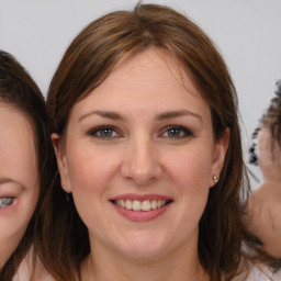 Joyful white young-adult female with medium  brown hair and blue eyes