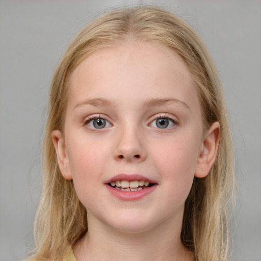 Joyful white child female with medium  brown hair and blue eyes