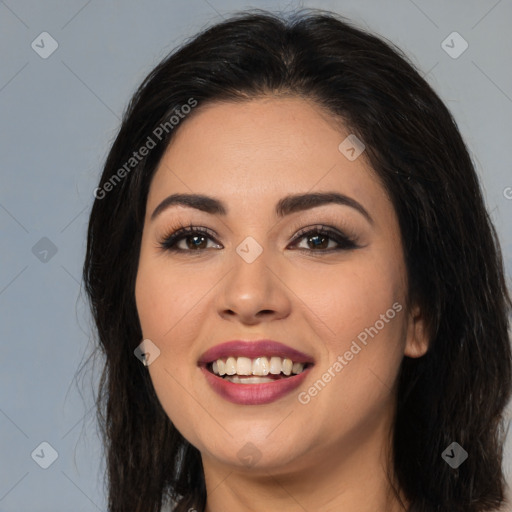 Joyful latino young-adult female with long  brown hair and brown eyes