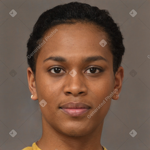 Joyful black young-adult female with short  brown hair and brown eyes