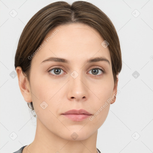 Neutral white young-adult female with short  brown hair and grey eyes