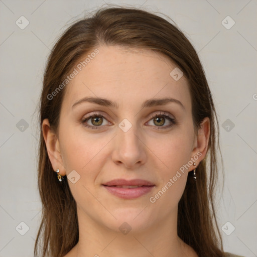 Joyful white young-adult female with long  brown hair and green eyes