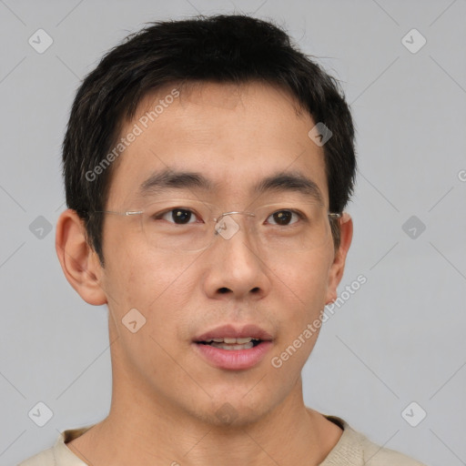 Neutral asian young-adult male with short  brown hair and brown eyes