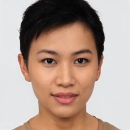 Joyful asian young-adult female with short  black hair and brown eyes