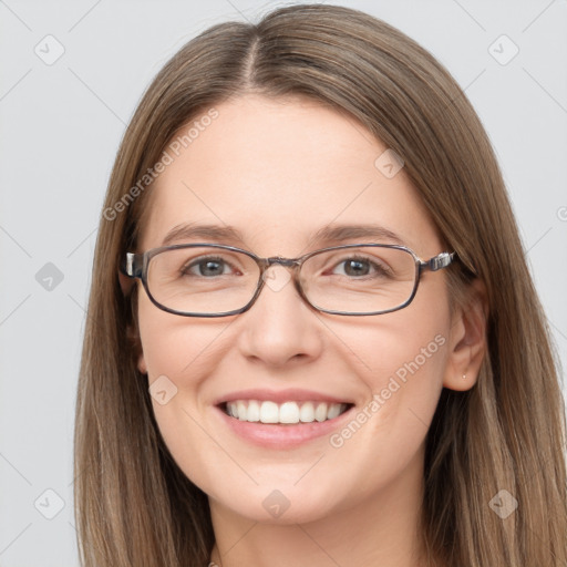 Joyful white young-adult female with long  brown hair and grey eyes