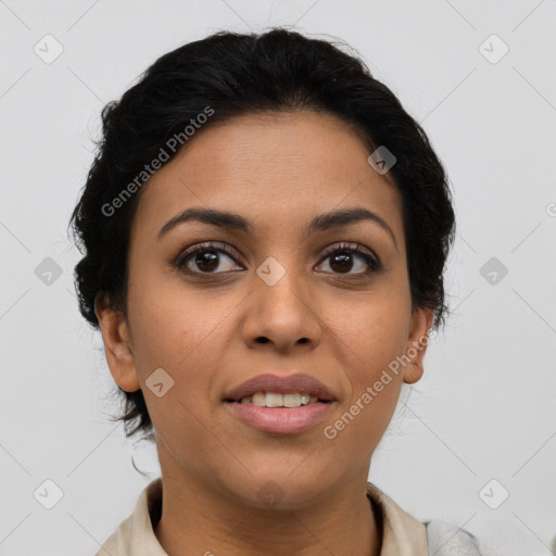 Joyful latino young-adult female with short  brown hair and brown eyes