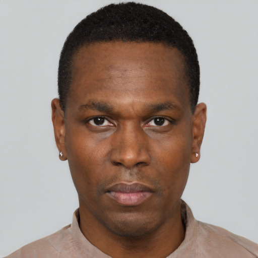 Neutral black young-adult male with short  black hair and brown eyes