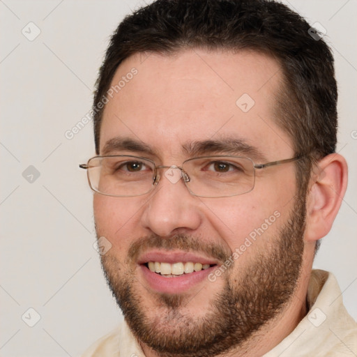 Joyful white adult male with short  brown hair and brown eyes