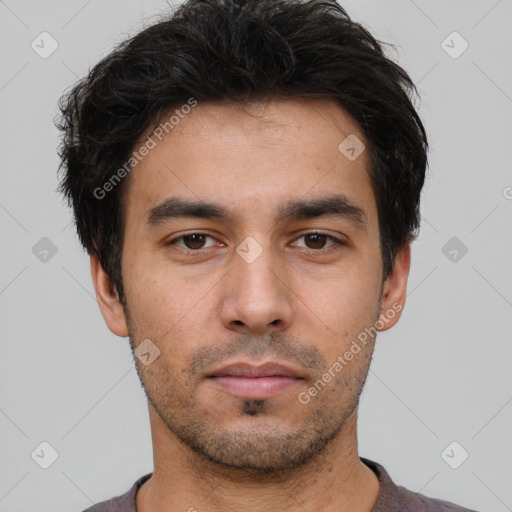 Neutral white young-adult male with short  black hair and brown eyes