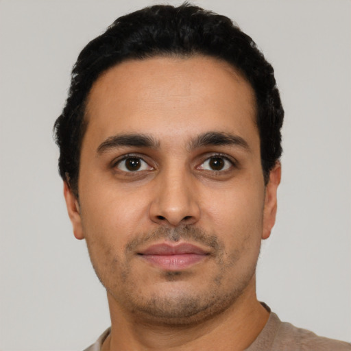 Neutral latino young-adult male with short  black hair and brown eyes