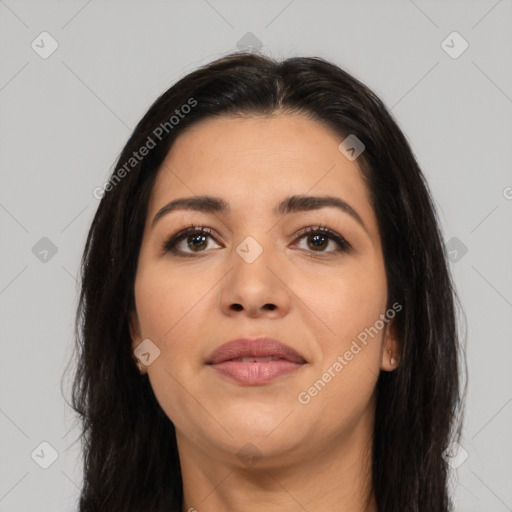 Joyful latino young-adult female with long  brown hair and brown eyes