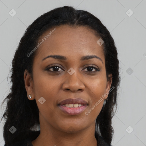 Joyful black young-adult female with long  brown hair and brown eyes